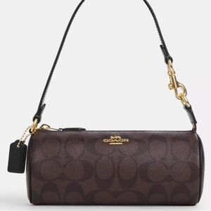 Coach Brown and Black Signature Barrel Bag Nolita Barrel Bag In Signature Canvas